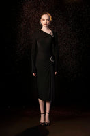 Black Melanie bodycon midi dress by Le Thanh Hoa, fitted design with long sleeves, showcased on a model.