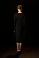 Black Melanie Bodycon Midi Dress by Le Thanh Hoa, fitted silhouette, sleeveless design, and knee-length style.