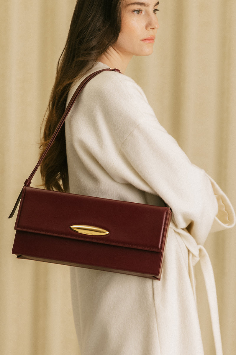 LEGANS BAGUETTE BAG IN BURGUNDY LEATHER