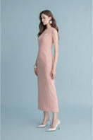 Pink LEKIEU Duisburg midi dress, flowing fabric and stylish design, shown on a model.