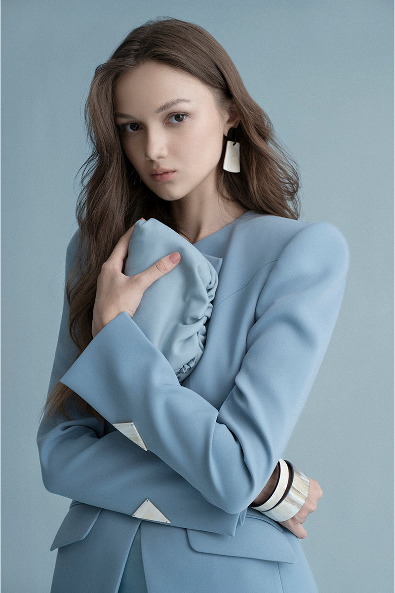 Blue LEKIEU Berlin jacket, stylish lightweight jacket with a modern fit, shown on a hanger.