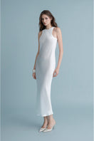 Off-white LEKIEU Bremen midi dress displayed on a hanger, showcasing its elegant design and fabric details.