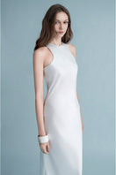 Off-white Bremen midi dress by LEKIEU, featuring a flowing design with elegant details, perfect for stylish occasions.