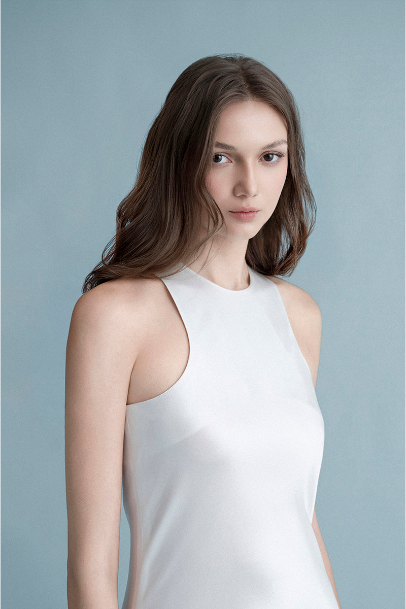 Off-white BREMEN midi dress by LEKIEU, featuring a stylish silhouette and elegant design, displayed on a hanger.