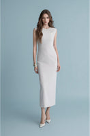 Off-white LEKIEU Muchen midi dress with flowing fabric and elegant design, showcased on a model.