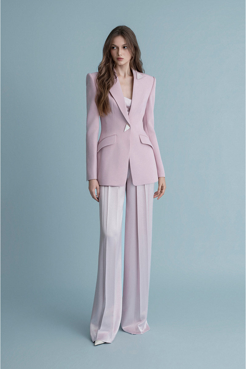 Pink WIESBADEN jacket by LEKIEU, featuring stylish design and comfortable fit, displayed on a hanger.