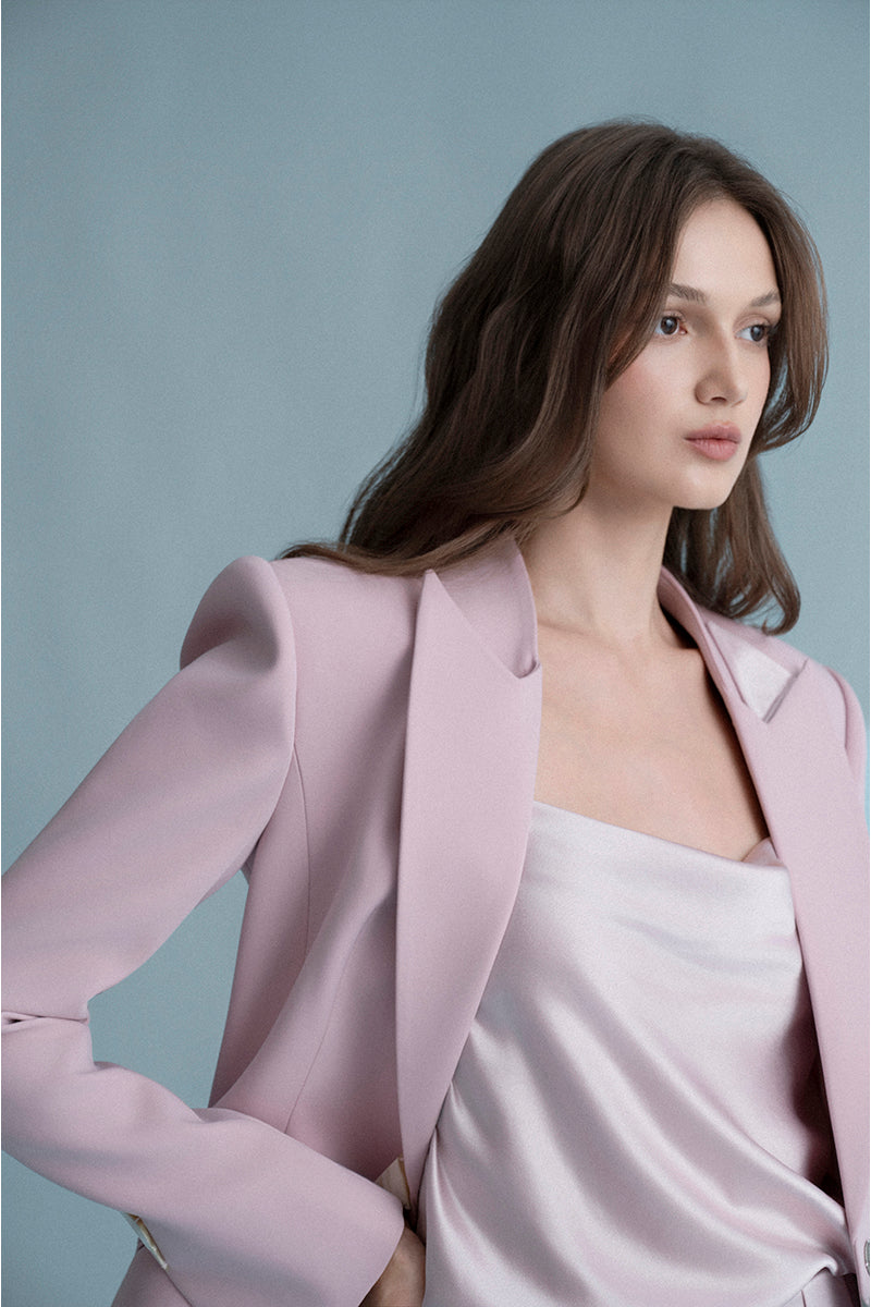 Pink WIESBADEN jacket by LEKIEU, stylish outerwear with a modern fit, shown on a hanger.