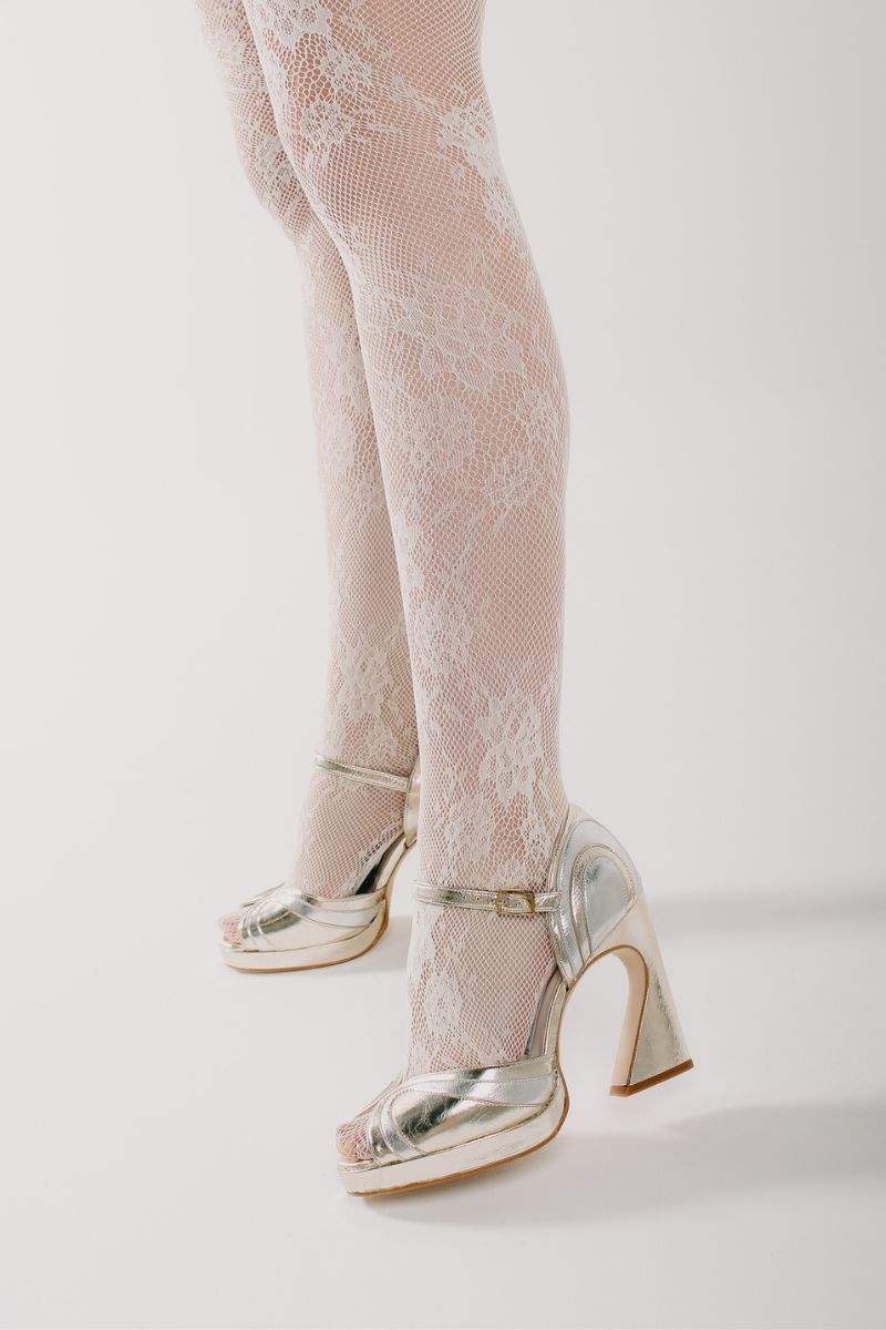 Terry de Havilland LILLITA heels in shiny gold and silver with pointed toes and elegant design displayed on a neutral background.