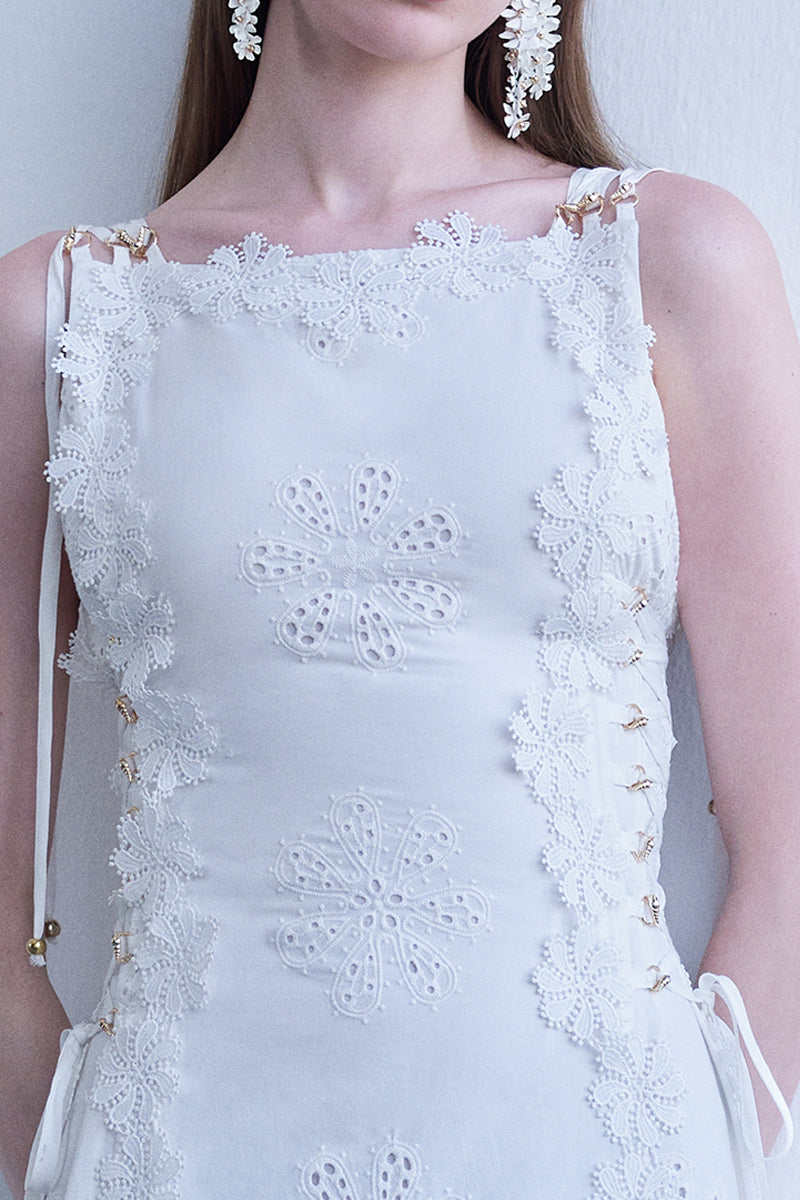 AISA Linda midi dress in soft fabric, featuring a flowing silhouette and elegant design, shown on a hanger.