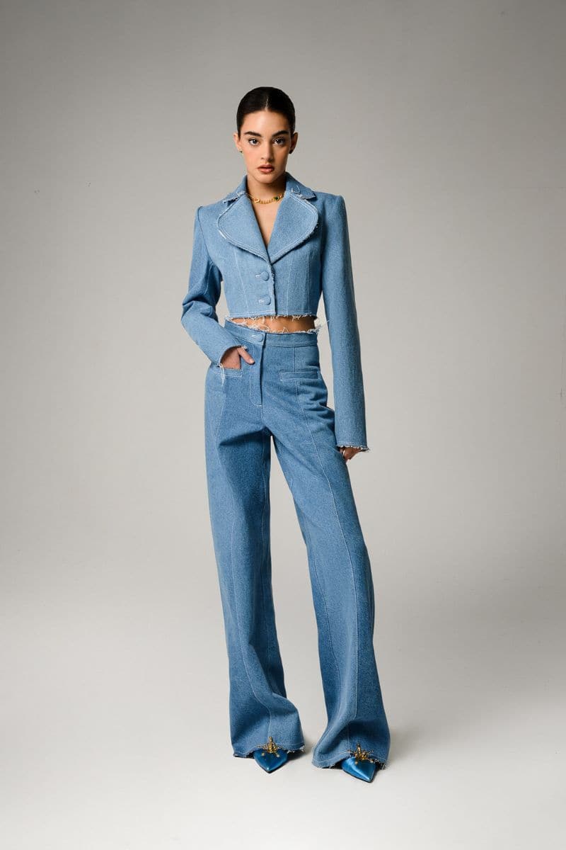 Liya Aqua Denim Cropped Blazer shown on a hanger with front view, featuring a tailored fit and classic collar.