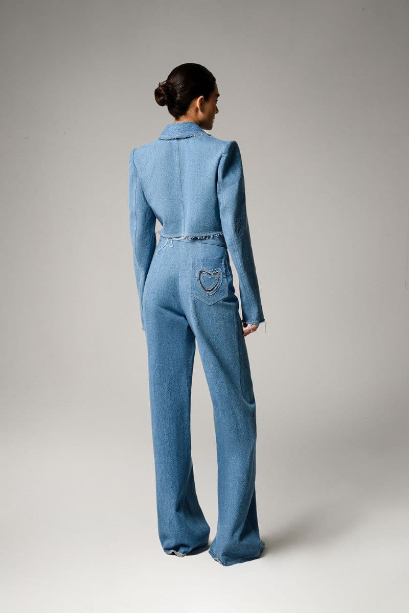 Liya Aqua Denim Cropped Blazer shown on a model with a tailored fit and long sleeves, styled for a casual chic look.