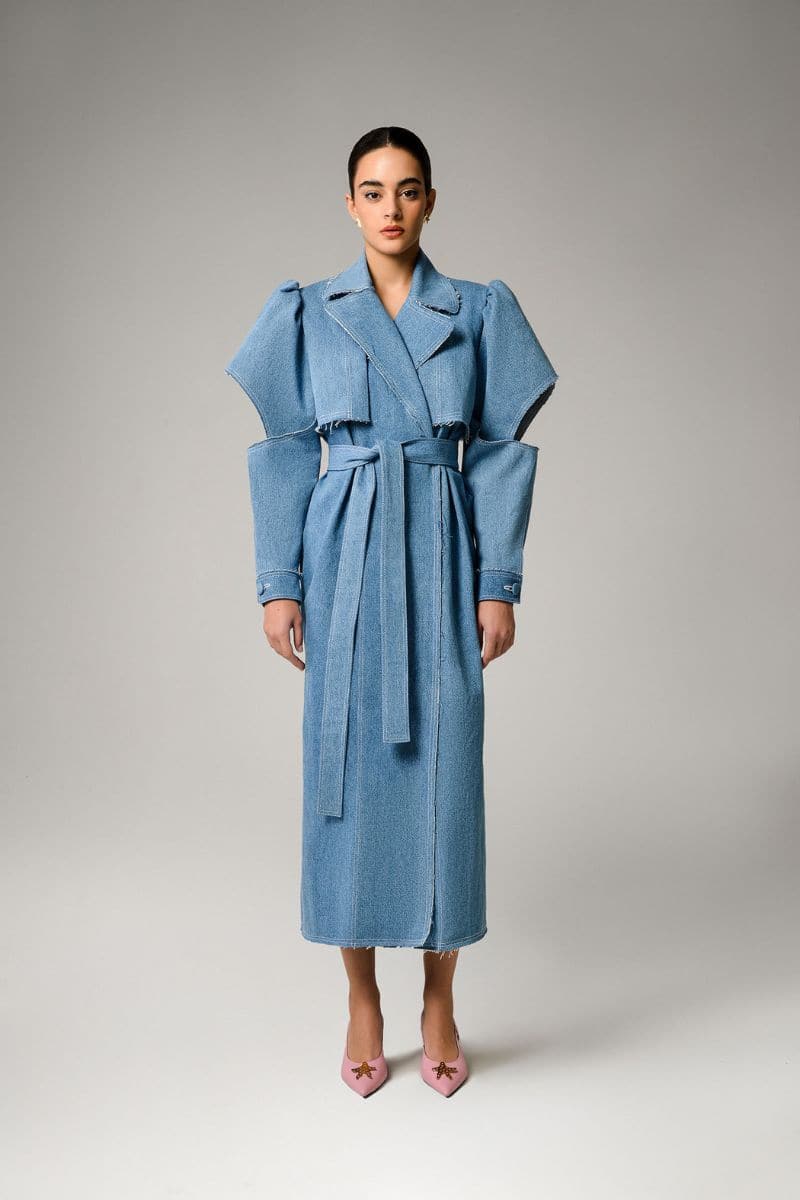 Liya Aqua Denim Cut-Out Trench Coat shown in aqua with cut-out details and classic trench design, stylish and lightweight.