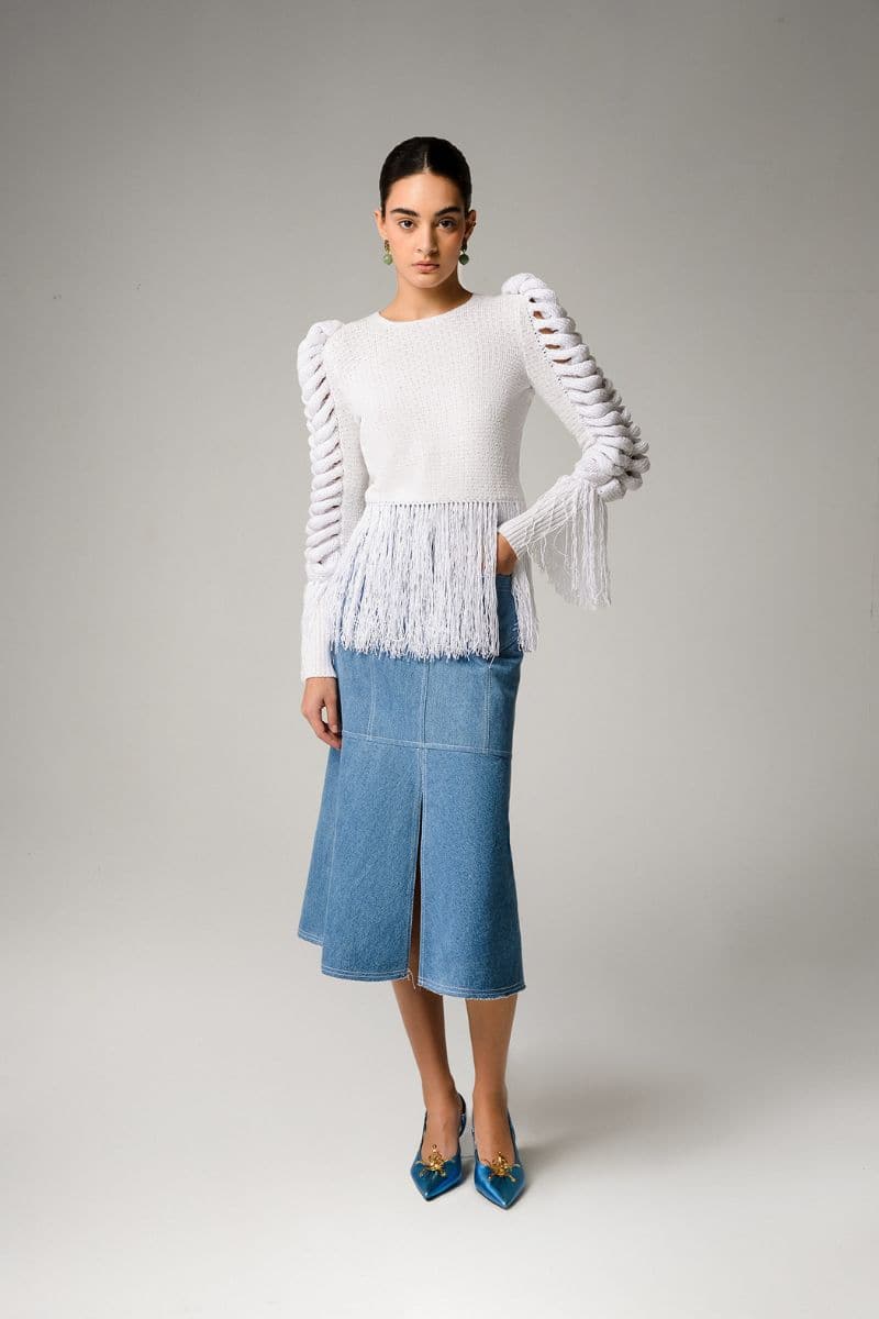 Liya Aqua Denim Midi Skirt displayed on a mannequin, showcasing a high-waisted design with a flowy, knee-length silhouette.