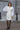 BELTED WHITE COAT WITH KNITTED SLEEVES | Liya | CULT MIA