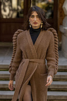 Dark brown, hand-knitted coat by Liya featuring a cozy, textured design and tailored fit for stylish warmth.