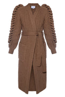Dark brown Liya hand-knitted coat with long sleeves and textured knit pattern, stylish and cozy for cold weather.