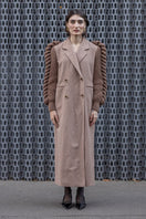 Liya camel double-breasted knitted sleeves coat in camel brown, featuring a stylish collar and button closure.