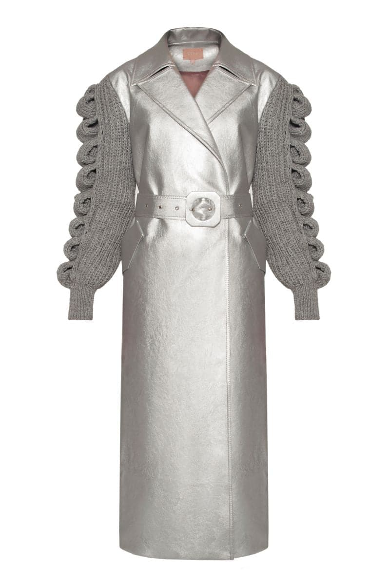 Liya Cult Mia X Liy Disco Trench Coat in metallic silver with shiny, reflective fabric and classic trench design.