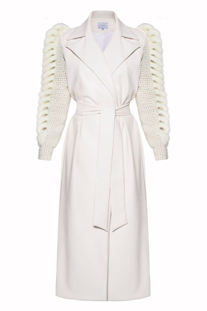 Liya ivory knitted-sleeves trench coat, stylish outerwear with textured knitted sleeves and classic trench design.