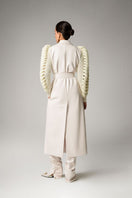 Liya ivory knitted sleeves trench coat, stylish long coat with knitted sleeve details, elegant and warm outerwear for women.