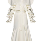 Liya ivory trench coat displayed hanging, featuring classic double-breasted design with belt and tailored fit.