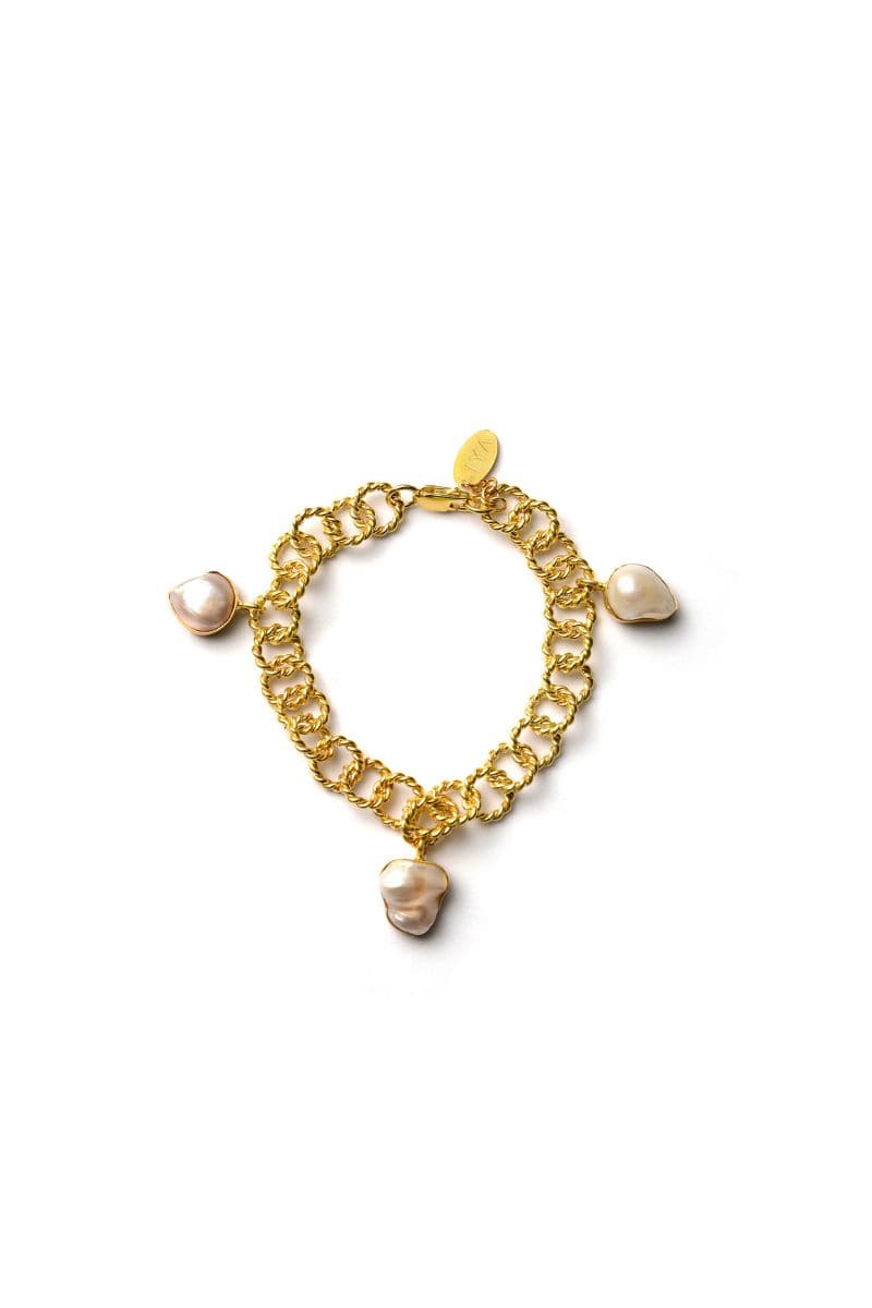 Liya Pearline Charm Bracelet in gold with delicate charms, stylish accessory for elegant wristwear.