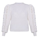 Liya white turtleneck sweater with a cozy fit, featuring a classic design and soft knit fabric.