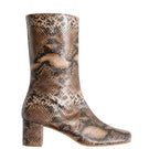 Terry de Havilland Lola Sand boots with chunky heel and beige leather straps, stylish footwear for casual or dressy outfits.
