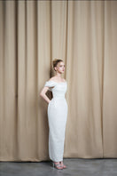 Ivory off-shoulder sequin gown by HACCHIC COUTURE featuring draped design, elegant formal dress with sparkling embellishments.