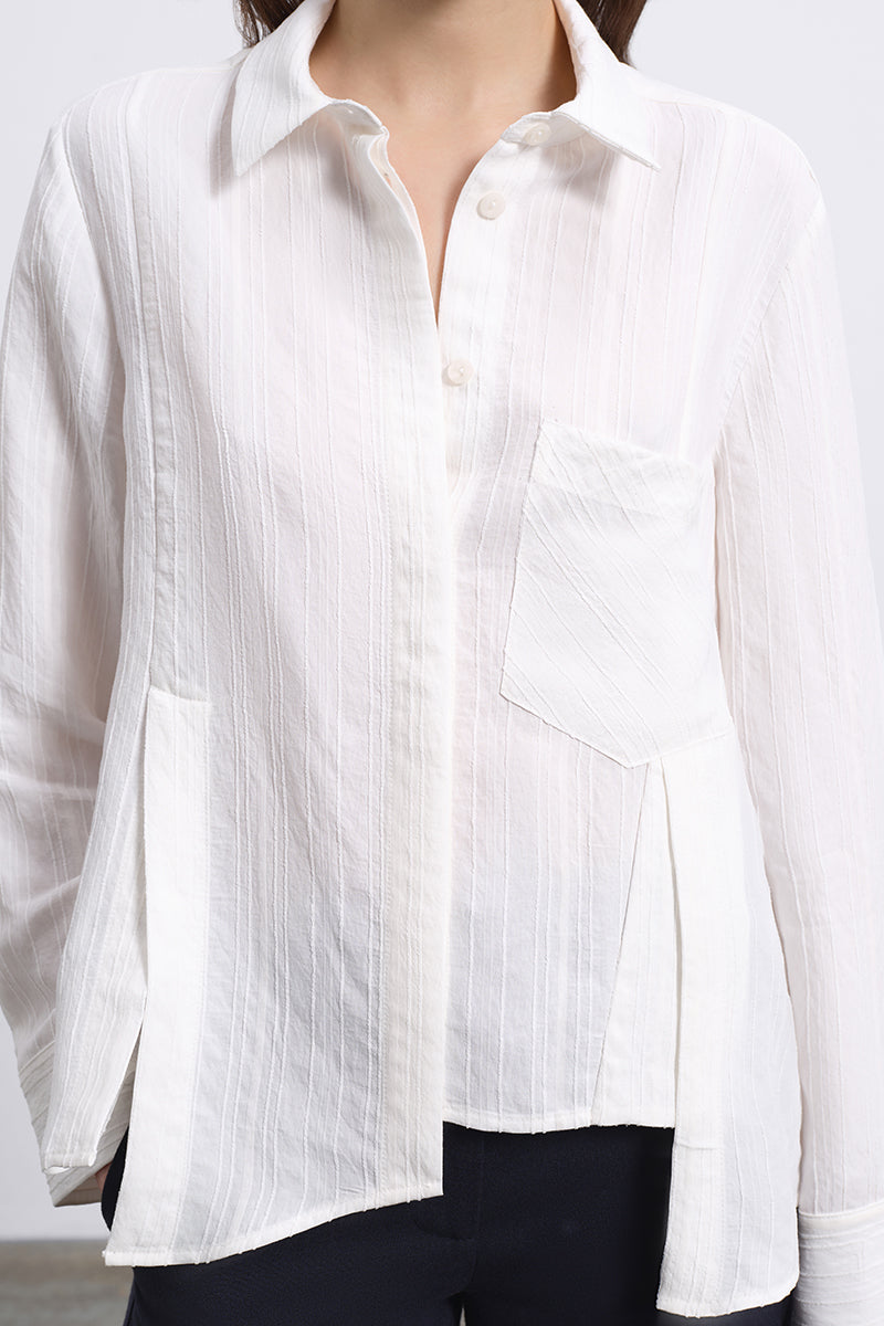 SÉLONE LORIN asymmetric stripe shirt in ecru, featuring bold vertical stripes and a modern, stylish fit.