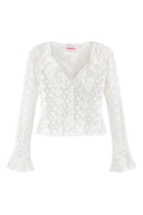 White Señorita Lucia blouse featuring a stylish, lightweight shirt with a relaxed fit and elegant collar, shown on a model.