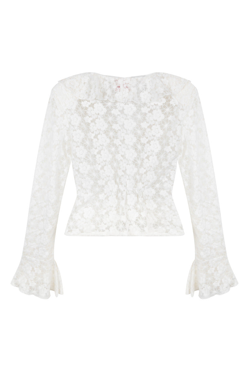 Señorita Lucia white blouse, stylish shirt with a relaxed fit, back view showing lightweight fabric and elegant design.