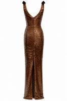 Light brown LUMINA gown by URBAN MUSE featuring elegant fabric and a flowing silhouette, shown in the product image.