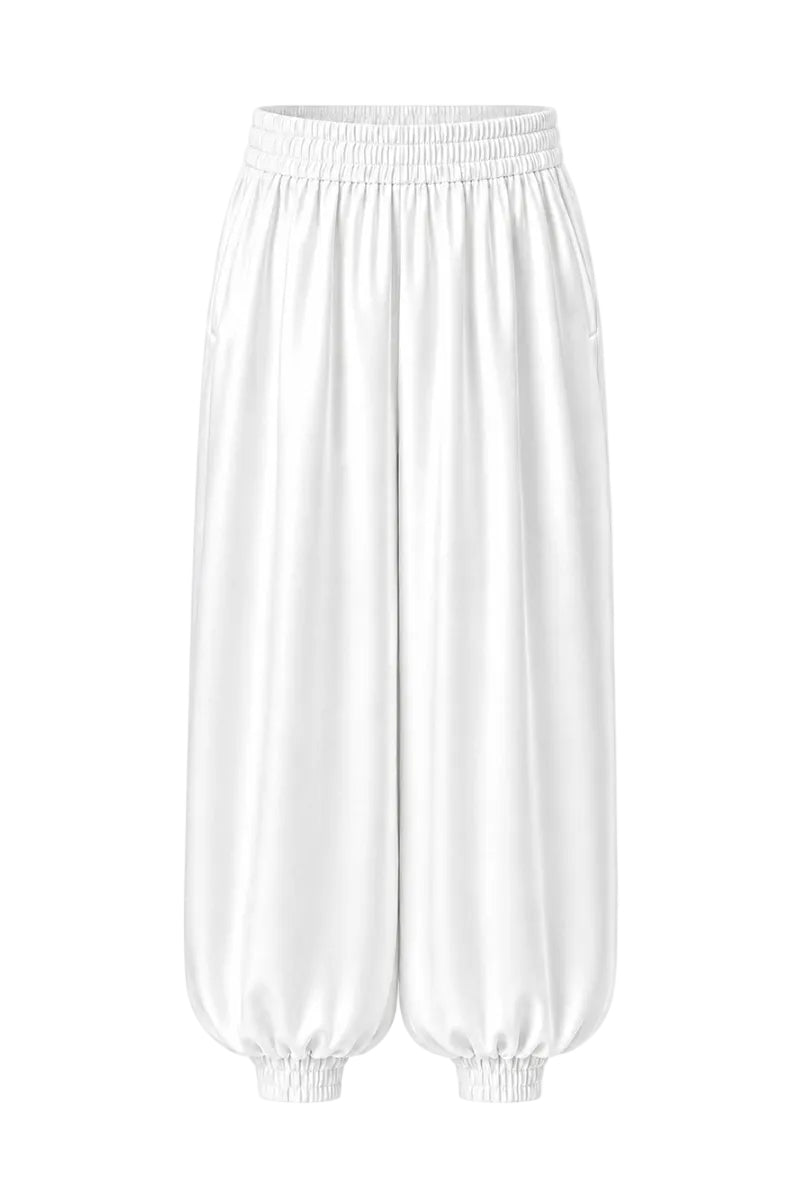 White Marea Pants by Izakova, stylish and comfortable pants with a relaxed fit, shown on a model.