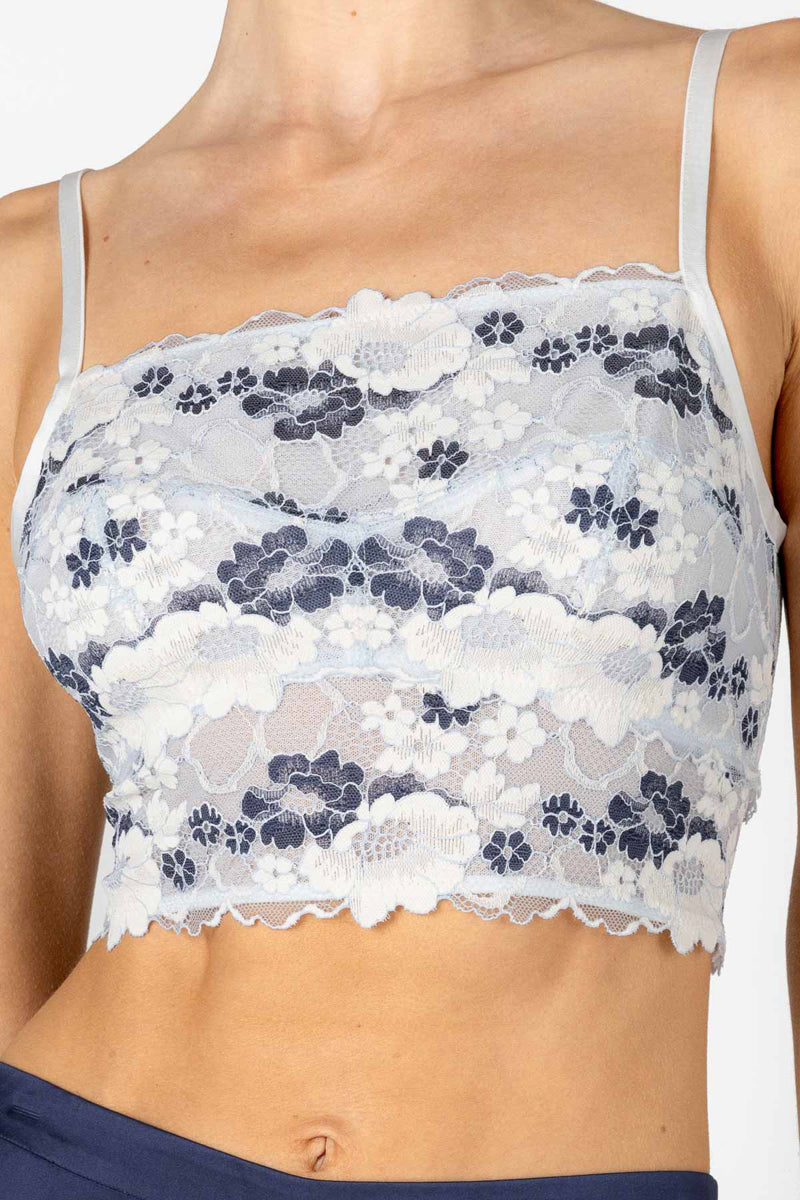 NK IMODE Marisa Charming BS bandeau bralette in ivory, featuring a soft fabric and delicate design, shown on a hanger.