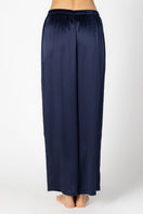 Back view of NK Imode Marisa Charming Lounge Silk Trouser in Evening Blue, showcasing relaxed fit and smooth silk fabric.