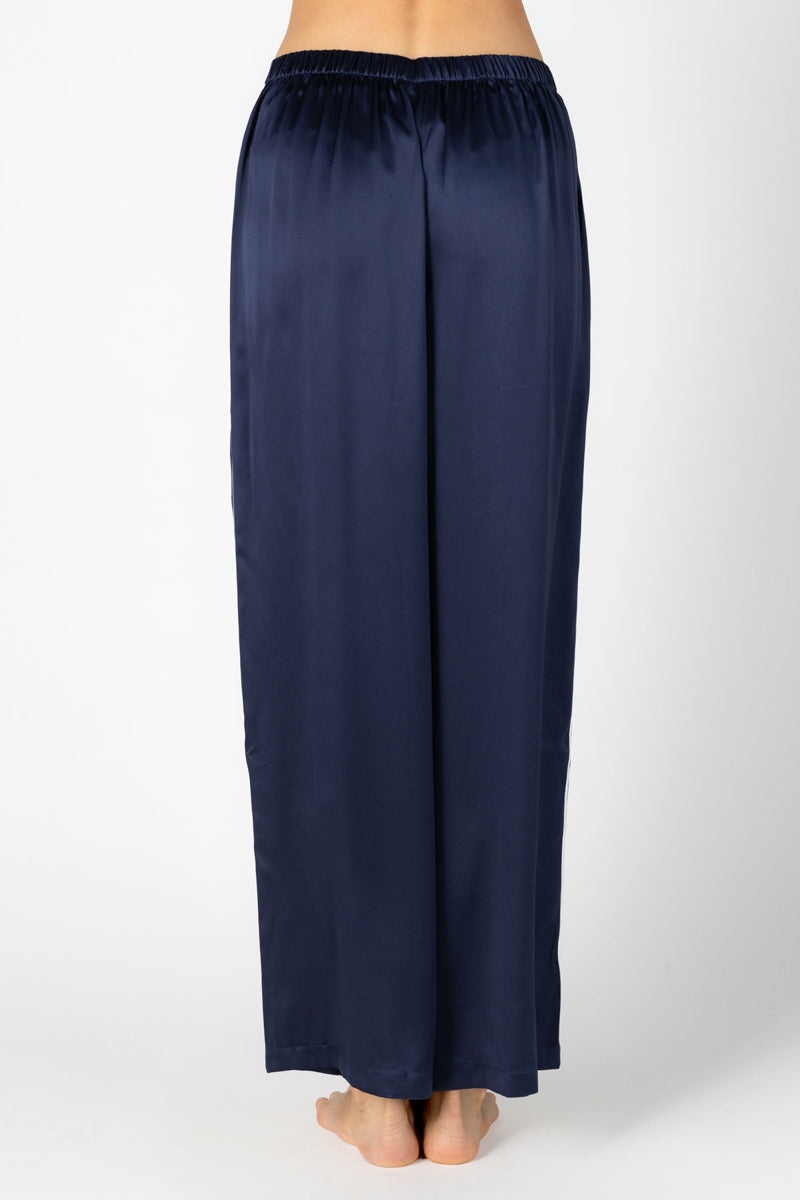 Back view of NK Imode Marisa Charming Lounge Silk Trouser in Evening Blue, showcasing relaxed fit and smooth silk fabric.