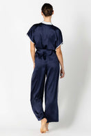 Back profile of NK IMODE Marisa charming silk kimono wrap jacket in elegant evening blue, showcasing its relaxed loungewear style.
