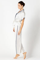 Side profile of NK IMODE Marisa charming silk kimono wrap jacket in ivory, showcasing its elegant loungewear design and soft fabric.