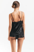Black silk camisole with lace spaghetti straps from NK Imode Morgan loungewear collection, featuring a delicate, feminine design.