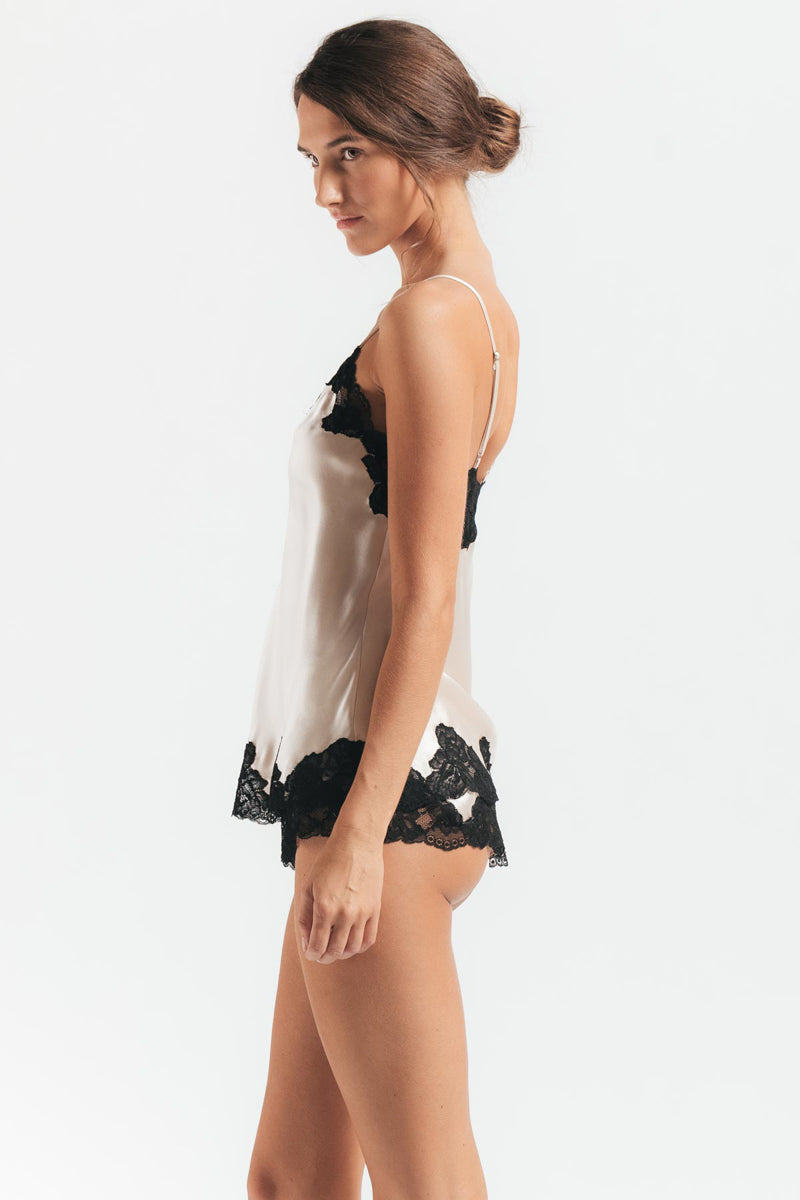 NK IMODE Morgan lace spaghetti silk camisole in champagne, featuring delicate lace details and a silky smooth finish.