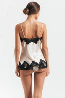 NK IMODE Morgan lace silk camisole in champagne, featuring delicate lace spaghetti straps and smooth silk fabric for elegant loungewear.