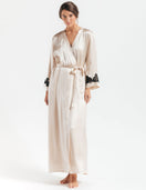 NK IMODE Morgan long silk robe draped open, showcasing smooth fabric and elegant design on a neutral background.