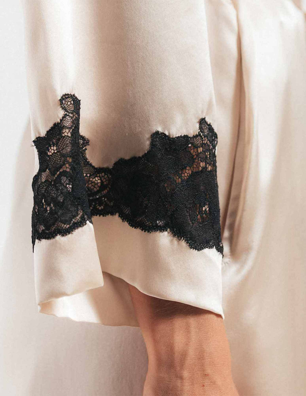 NK IMODE Morgan long silk robe displayed on a hanger, showcasing smooth fabric and elegant design.