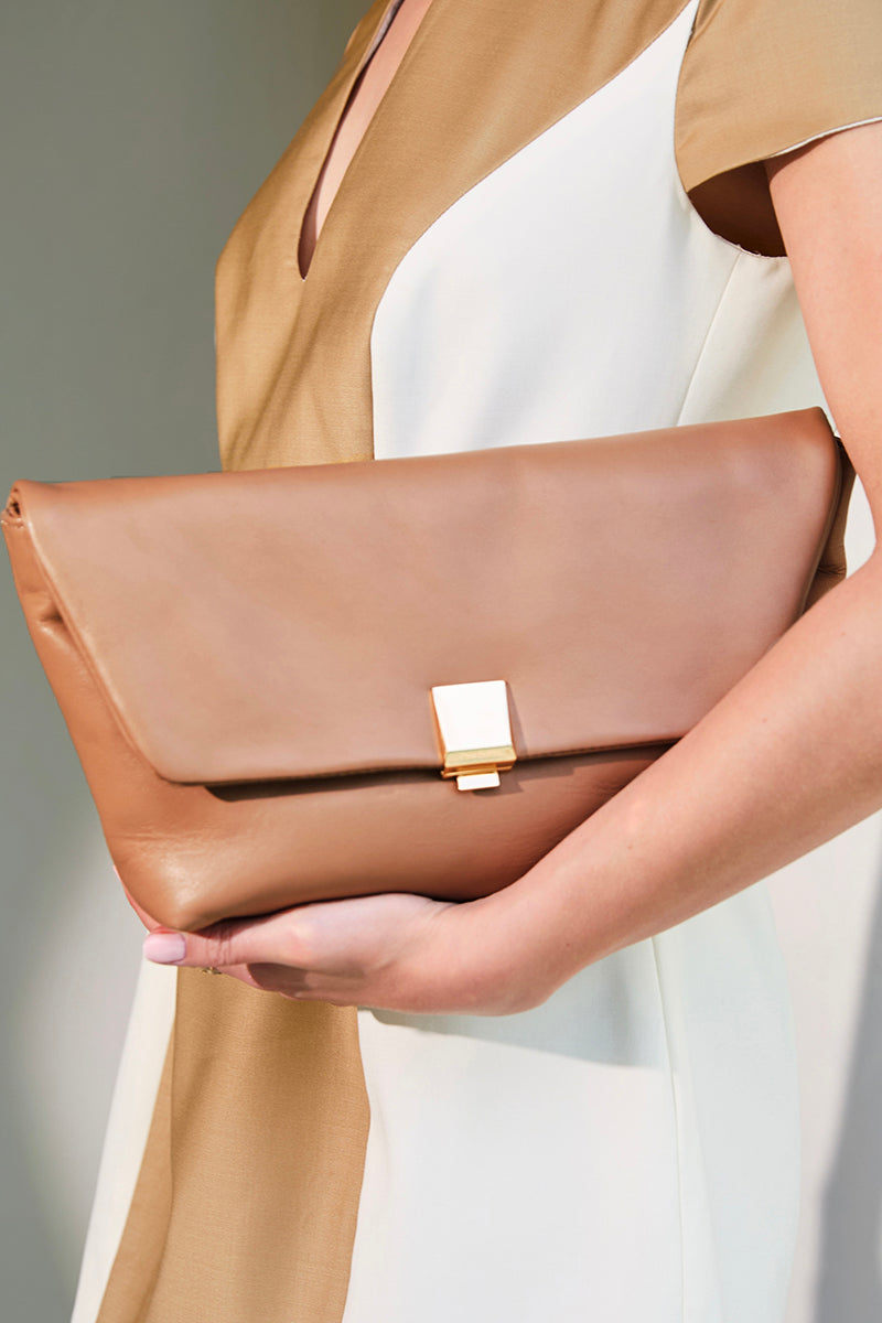 Rose de Mai FAYE clutch in caramel, stylish leather clutch bag with sleek design and gold-tone hardware.