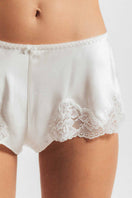 NK Imode Morgan Retro Silk Tap Pant in ivory, stylish loungewear with a loose fit and silky texture, displayed on a plain background.