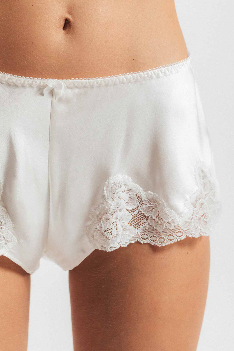 NK Imode Morgan Retro Silk Tap Pant in ivory, stylish loungewear with a loose fit and silky texture, displayed on a plain background.