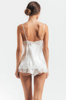 Ivory silk camisole from NK Imode Morgan lace spaghetti loungewear, featuring delicate lace details and a comfortable fit.
