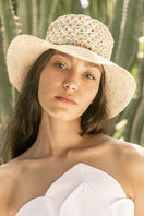 Modern Monarchie Millie straw bucket hat in natural color, stylish sun hat with wide brim and casual design.