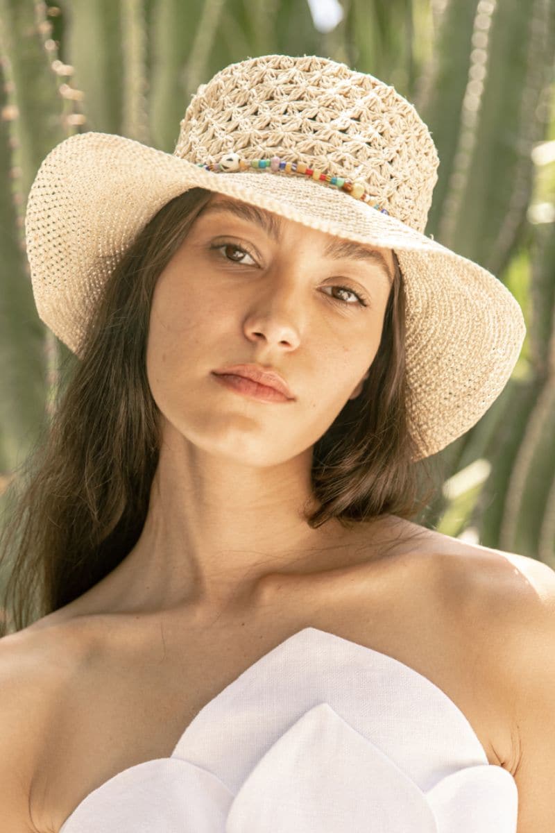 Modern Monarchie Millie straw bucket hat in natural color, stylish sun hat with wide brim and casual design.